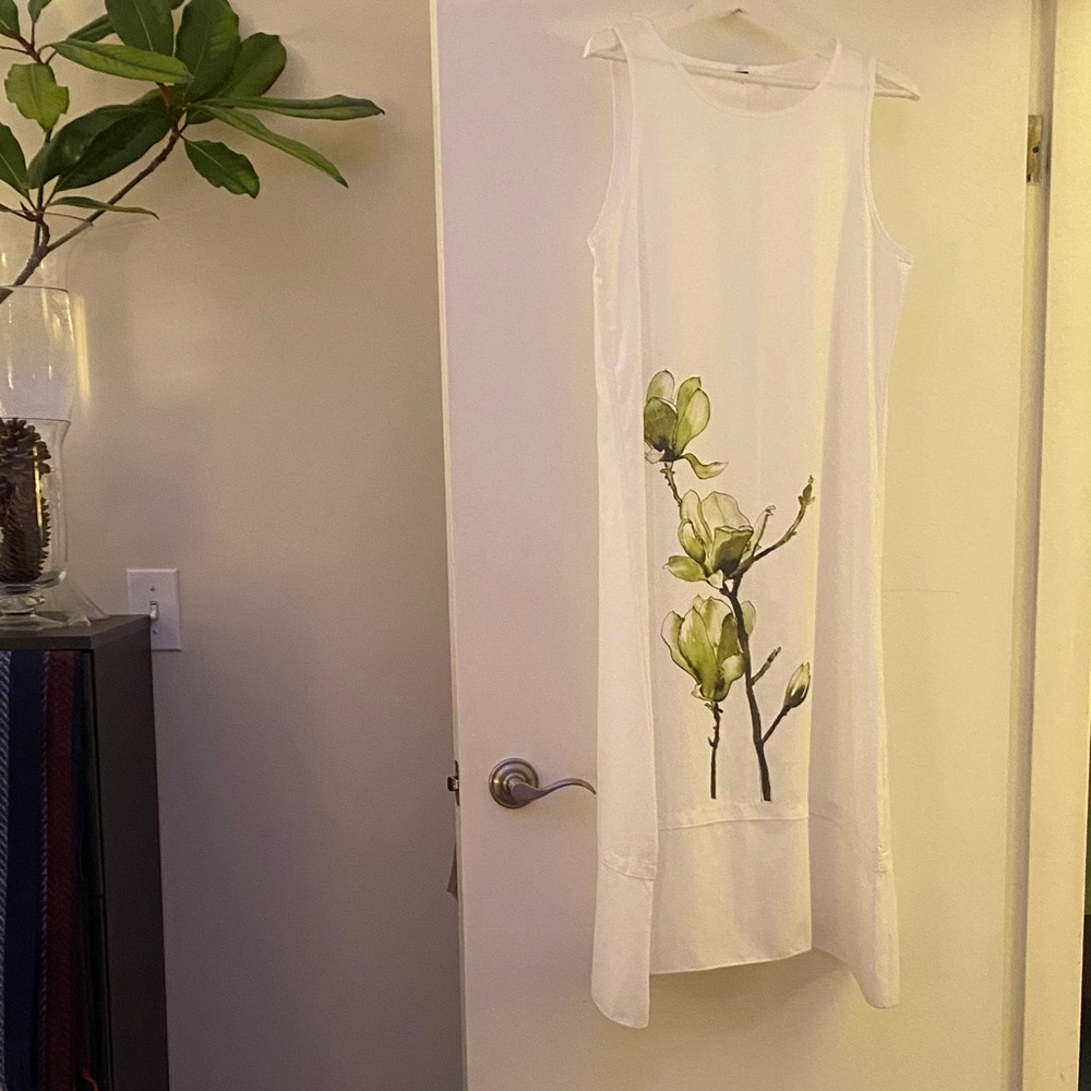 White Sleeveless Dress with Green Floral Design